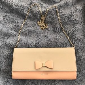 brand new GUESS bella travel clutch